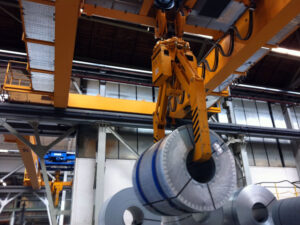 Coil tongs, coil tong, coil gripper, coil grab, telescope coil grab, horizontal coil tongs, tong for sheet coils, coil lifter, vertical coilgrab, parallelogram coilgrab, parallelogram coiltongs, Coil Lifting & Handling Equipment, LOAD HANDLING DEVICES