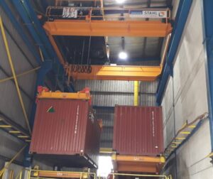 Container Spreader in a Warehouse