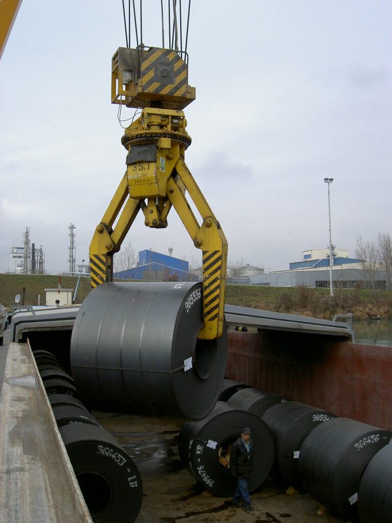 Coil tongs, coil tong, coil gripper, coil grab, telescope coil grab, horizontal coil tongs, tong for sheet coils, coil lifter, vertical coilgrab, parallelogram coilgrab, parallelogram coiltongs, Coil Lifting & Handling Equipment, LOAD HANDLING DEVICES, LHD, Load handling equipment