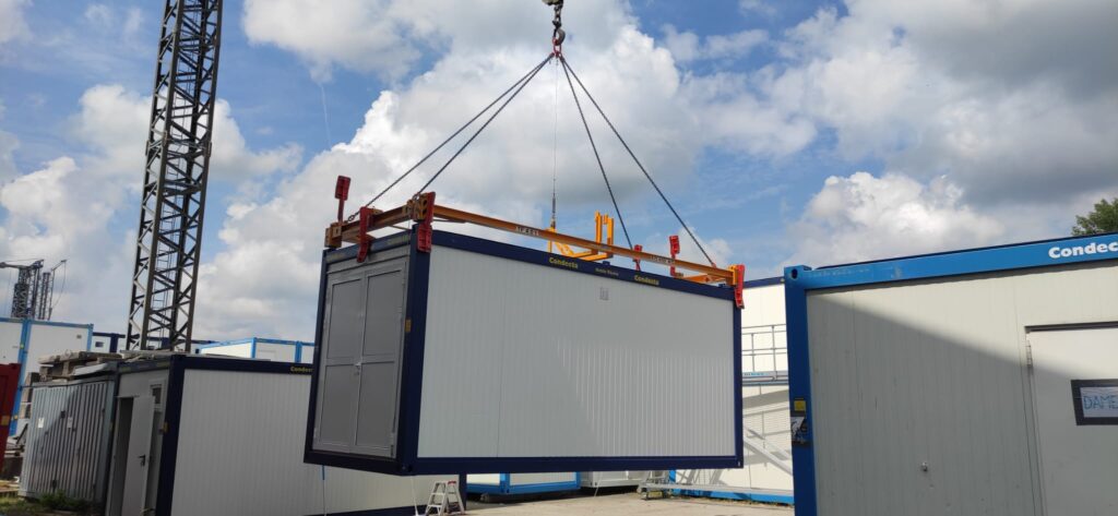 Container Spreader, Adapter Container Spreader, Containergreifer, Containertraverse, Lastaufnahmemittel, Überhöhungsrahmen, Überhöhenrahmen, Container Spreader, Lastaufnahmemittel, Containergeschirr, Hebegeschirr, Kranstreuer, Integral-Spreader, Nordgreif